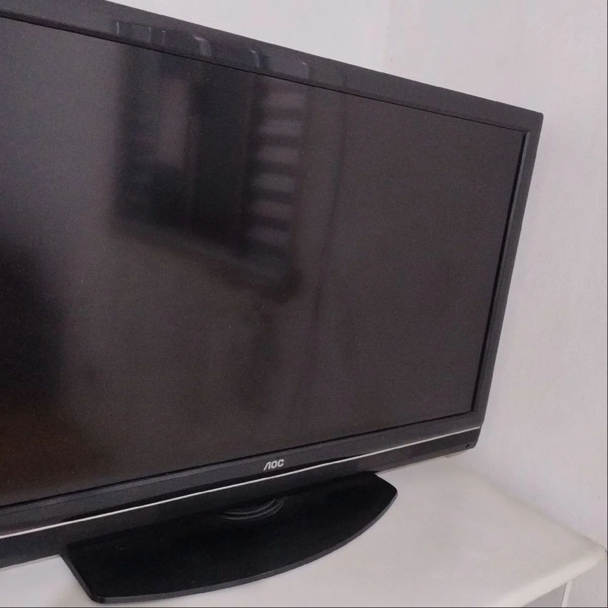 Tela da AOC apagou com 1 ano, conserto quase custava a TV — decisão da Justiça surpreende